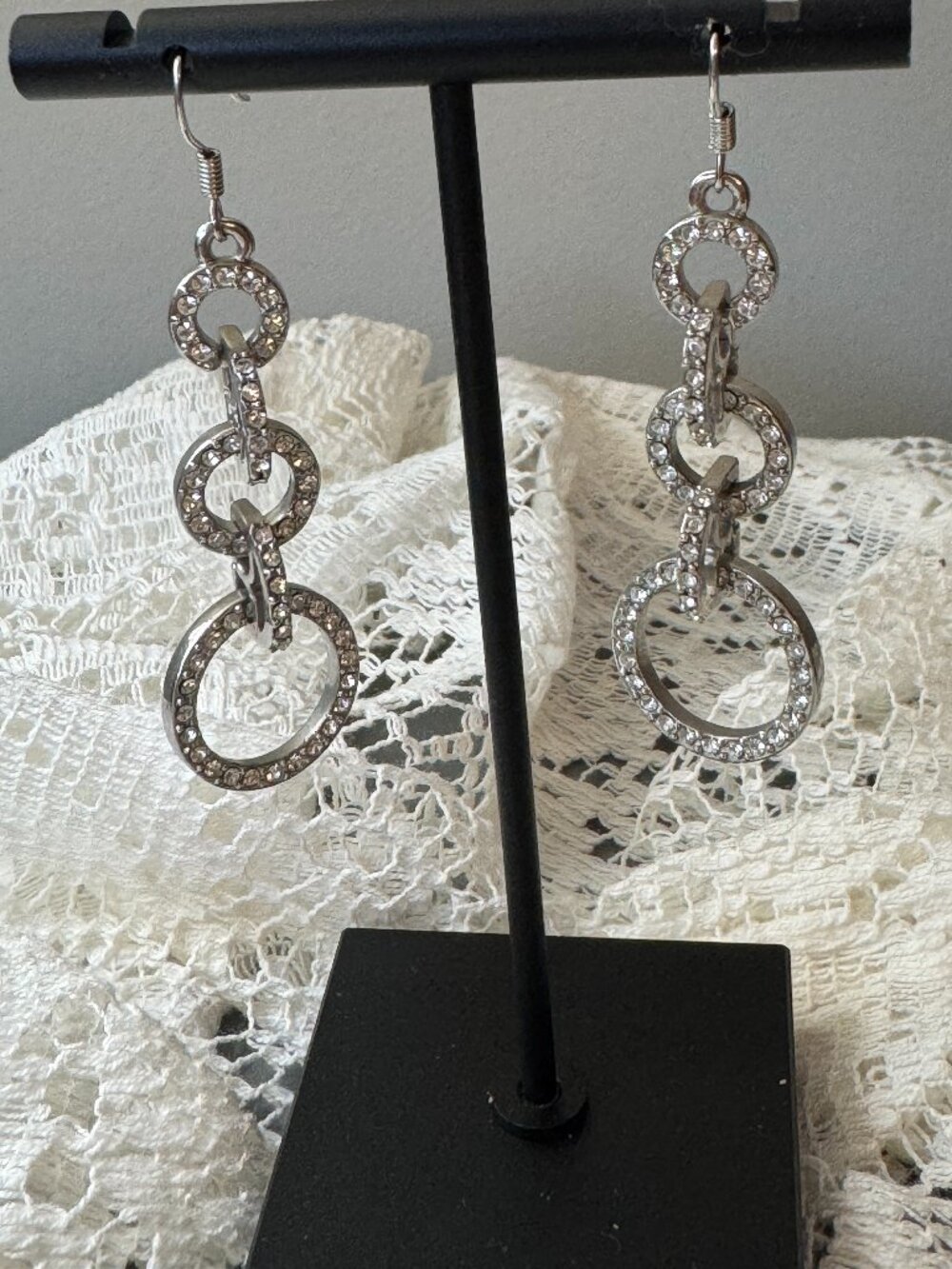 Glamorous Silvertone Interlocking Rhinestone Circle Drop Earrings
